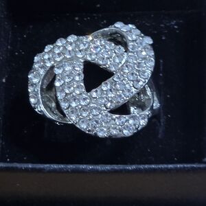 Loves Eternity Knot Rhinestone On Silver Tone Band Ring Sz 7